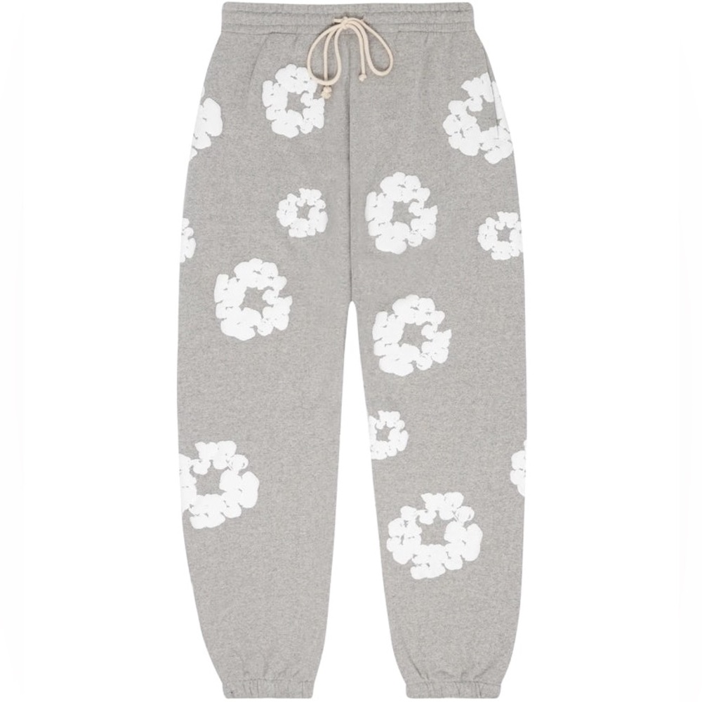 GREY DENIM TEARS SWEAT PANTS.